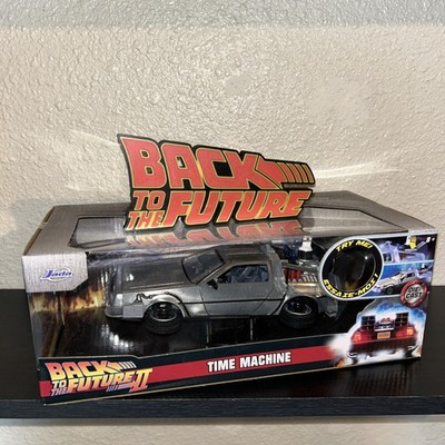 Jada Back to The Future II DeLorean Time Machine with Lights 1:24 Diecast + sign
