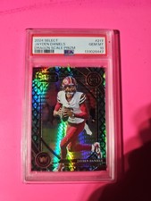 2024 Panini Select - Club Level Jayden Daniels #217 Dragon Scale Prizm /81 (RC)