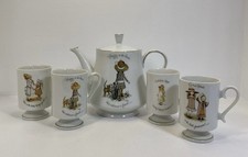 Vintage 1970  s Holly Hobbie Tea Set Teapot with Four Pedestal Mugs Collectible