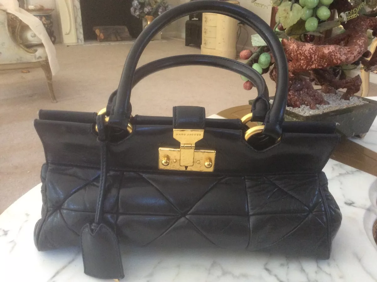 Handbag with lock and key sale