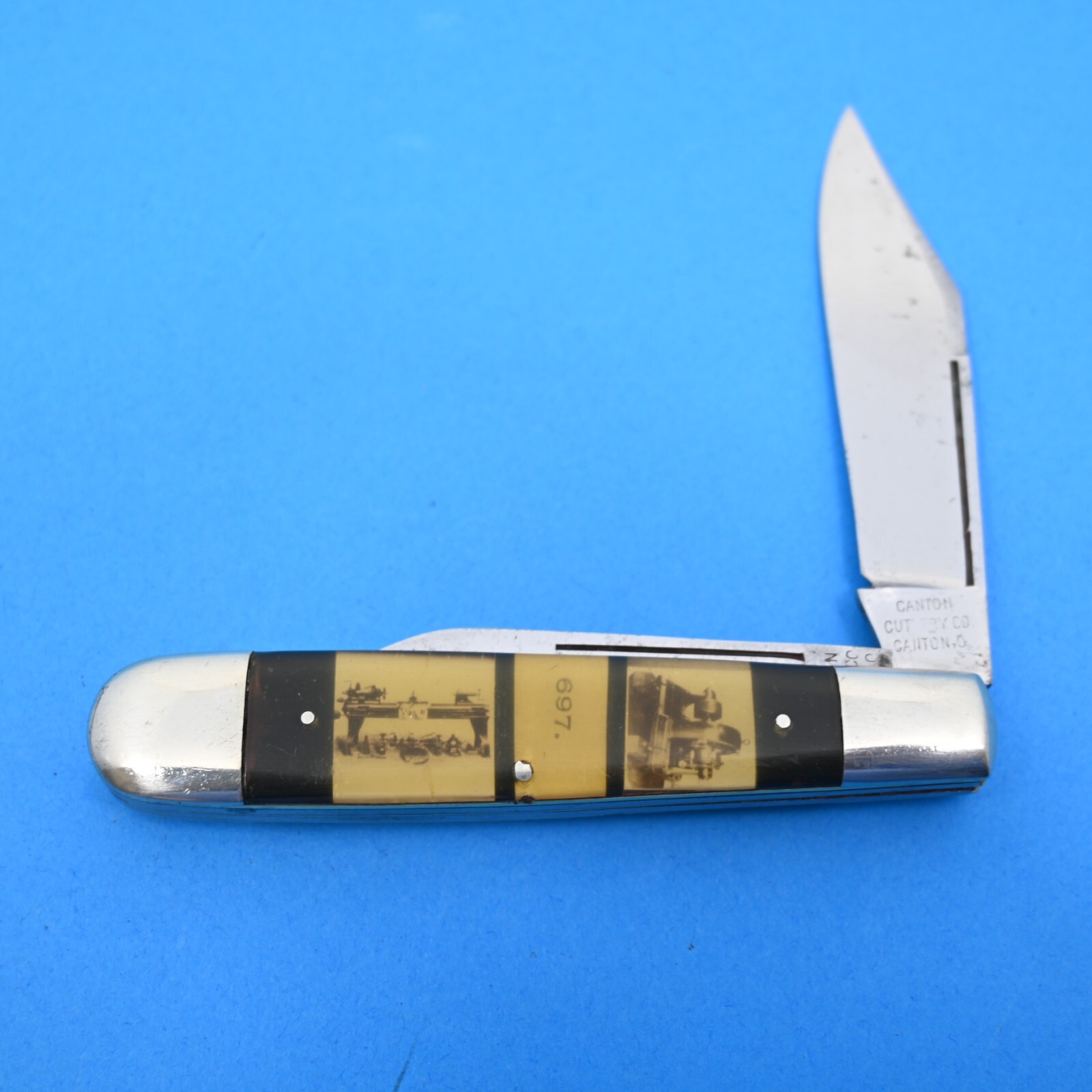 CANTON CUTLERY CO., CANTON, O. LARGE SLEEVEBOARD CELLULOID MINTY JACK