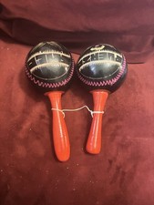 vintage handheld maracas featuring black gourd shakers