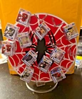 Bitty pop Spider Man Stand with 11 figures shown in photo