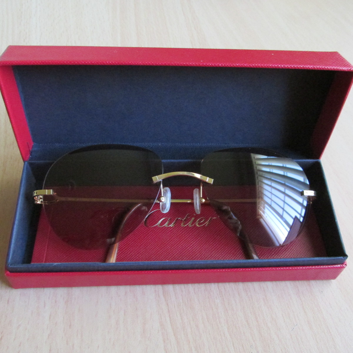 CARTIER Light Brown Gold Rimless 140 Unisex Sunglasses 100