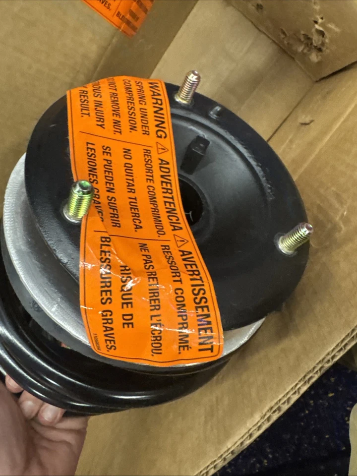 Conjunto de amortiguador de resorte helicoidal de puntal rápido delantero izquierdo MONROE 471582 2001-2005 BMW 325i Foto 2 de 4