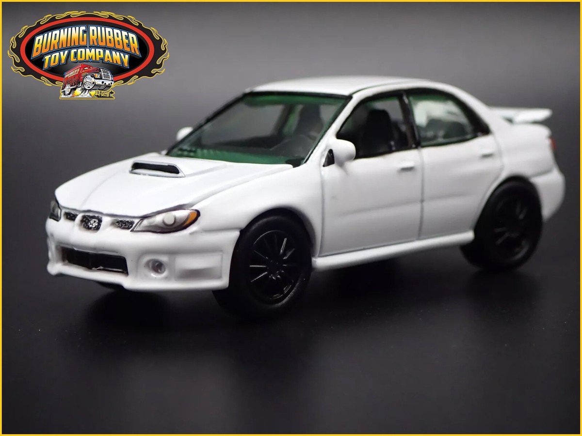 ミニカー SUBARU WRX STI CROSSTREK OUTBACK 1/64 US s-l400.jpg