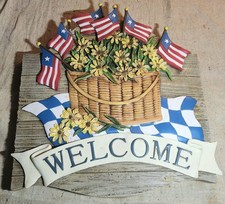 HEAVY RESIN HOME WELCOME SIGN WITH AMERICAN FLAGS  BASKET OF SUNFLOWERS DESIGN