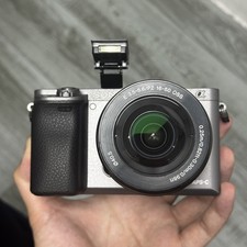 Sony Alpha A6000 24.3MP Mirrorless Digital Camera w/16-50mm Lens English Gray