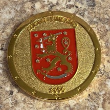 Finland Geocoin-UNACTIVATED Lion Rampant on red crest-Land of 187k lakes 2006