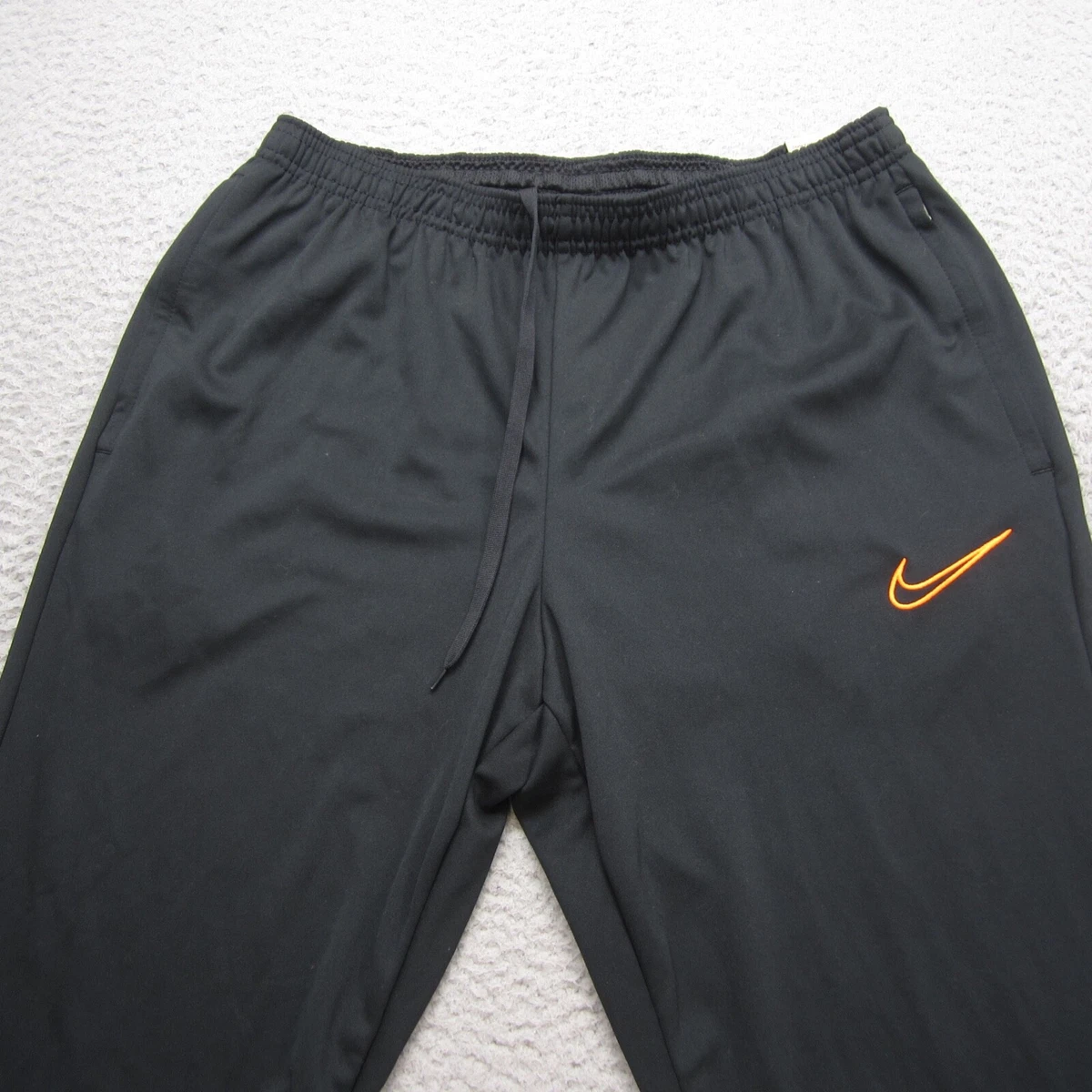 Nike windbreaker mens pants sale