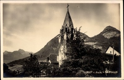 Ak Aigle Kanton Waadt, Kirchturm, Berge, Bäume,  aus Aigle - 4816312