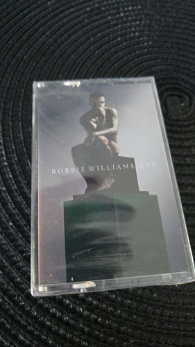 ROBBIE WILLIAMS-XXV -Green Cassette, New but case has a crack in it.