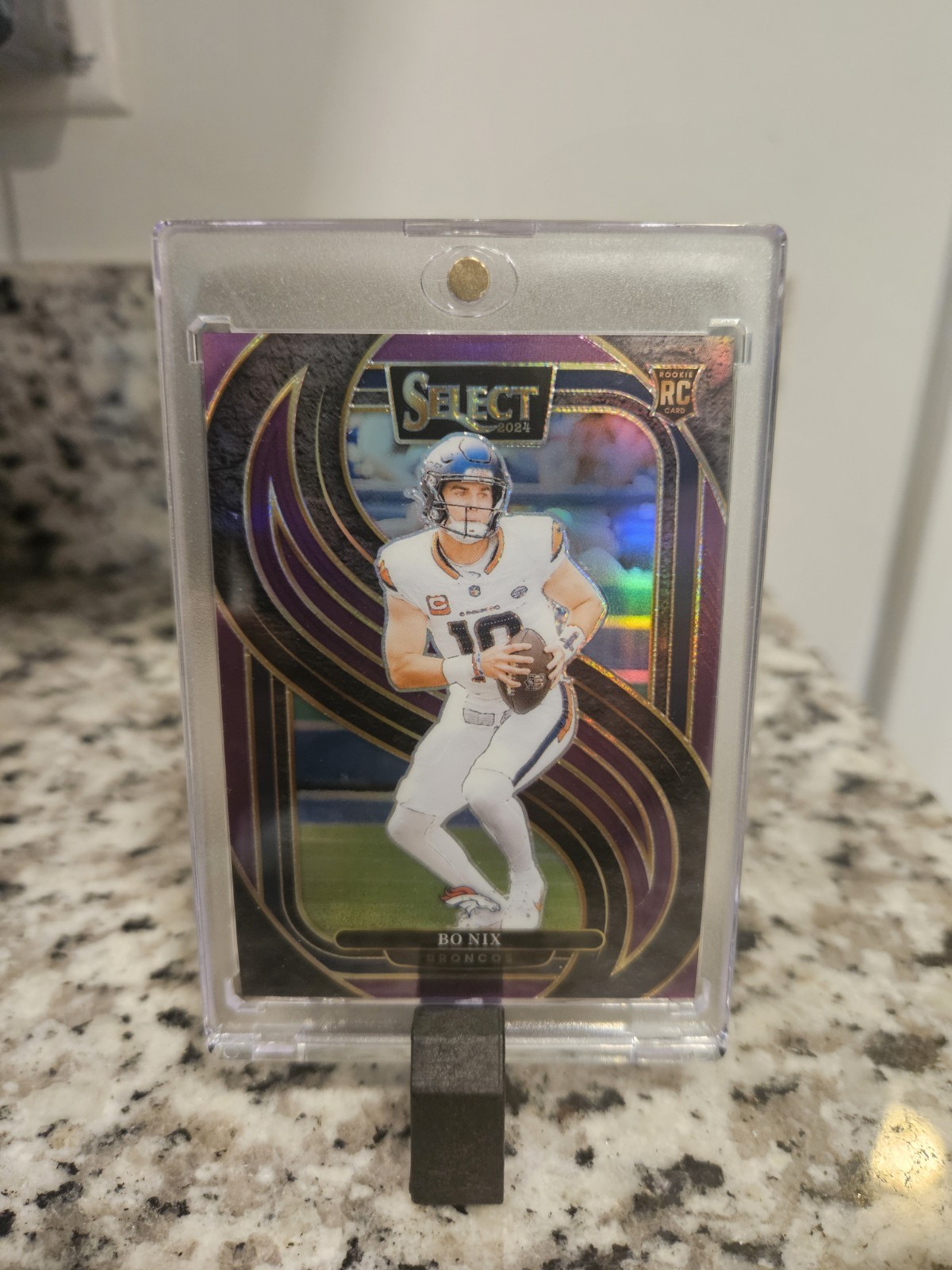 2024 Panini Select - Premier Level Bo Nix #117 Purple Prizm /75 (RC)