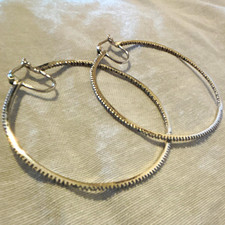 Silver Tone Textured Metal Round Hoop Earrings, Clip-On Closure