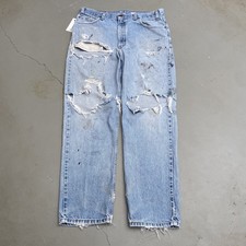 1990s Distressed Orange Tab Relaxed Fit Levi's Jeans