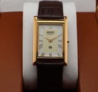 Vintage Seiko Slim Quartz Men's Wrist Watch White  Dial with Dark Brown Strap.