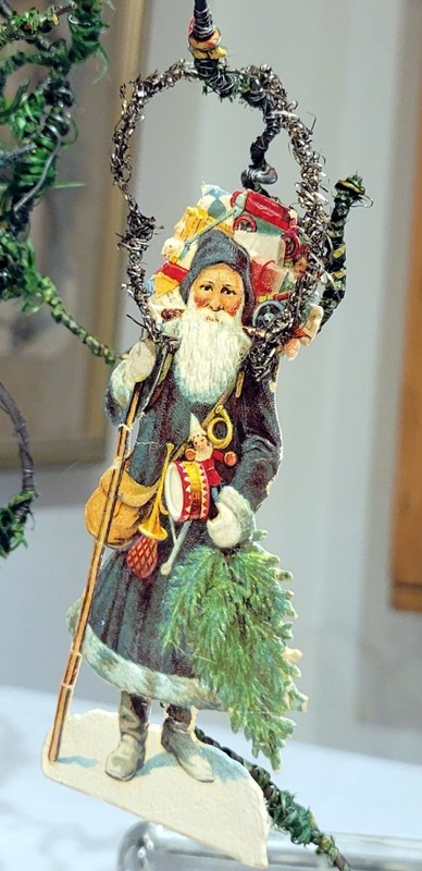 Purple robed Santa, with Oranges & Toys. Miniature Silver Tinsel & Paper Orn