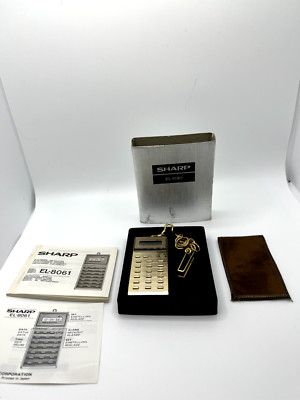 Sharp EL-8061 Vintage Mini Gold Taschenrechner mit OVP und kleiner Tasche