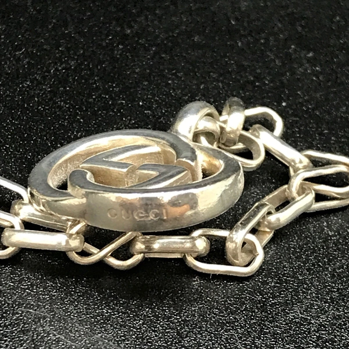 Collier pendentif logo GUCCI 295710 J8400 GG imbriqué argent G bijoux unisexes