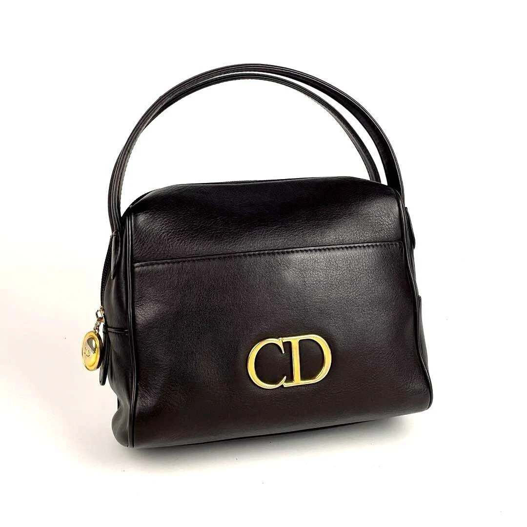 Sac à main Dior CD ovale or quincaillerie cuir marron foncé