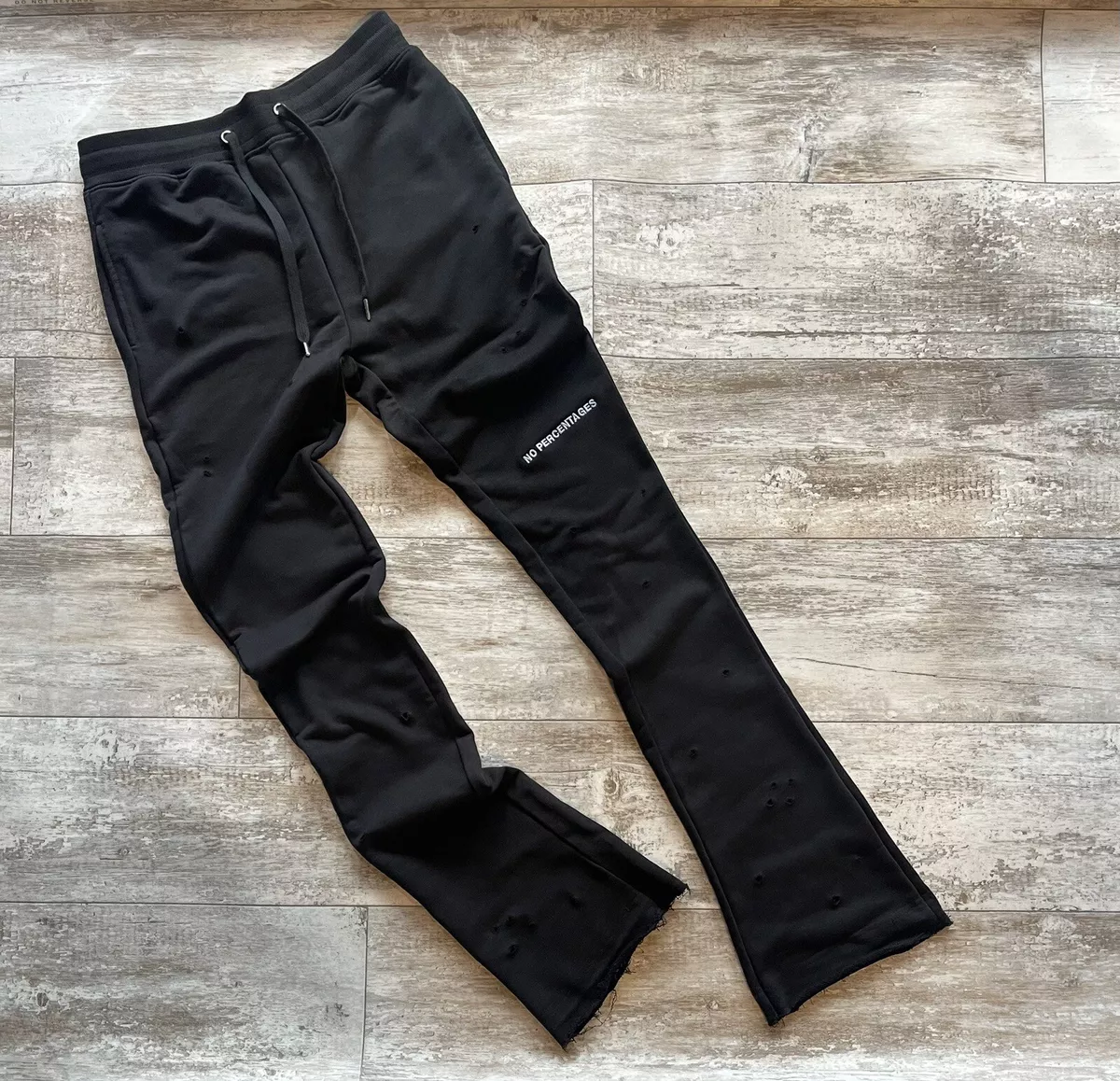 Black stacked sweatpants sales