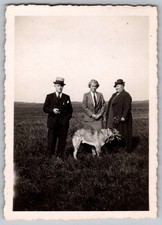 Vtg B&W Snapshot Three People in Suits Hats Dog Outdoors Field 1920s Deckle Edge