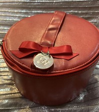 Carolina Herrera red round beauty case -TRAVEL IN STYLE