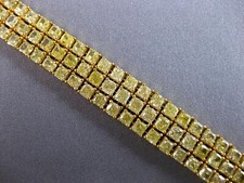 EXTRA LARGE 23.71CT FANCY YELLOW DIAMOND 18KT YELLOW GOLD 3 ROW TENNIS BRACELET