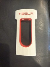 Tesla red and white phone charger accessory 