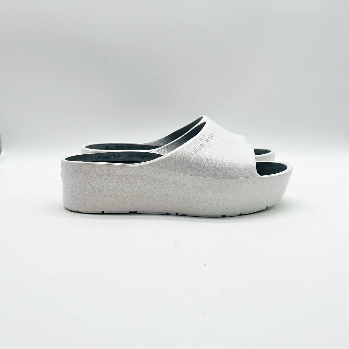 White platform sales jelly sandals