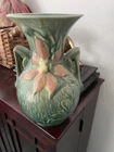 Vintage Roseville handled pottery vase, green with pink clematis flowers.