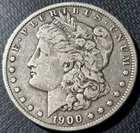 1900-O/CC MORGAN SILVER DOLLAR..