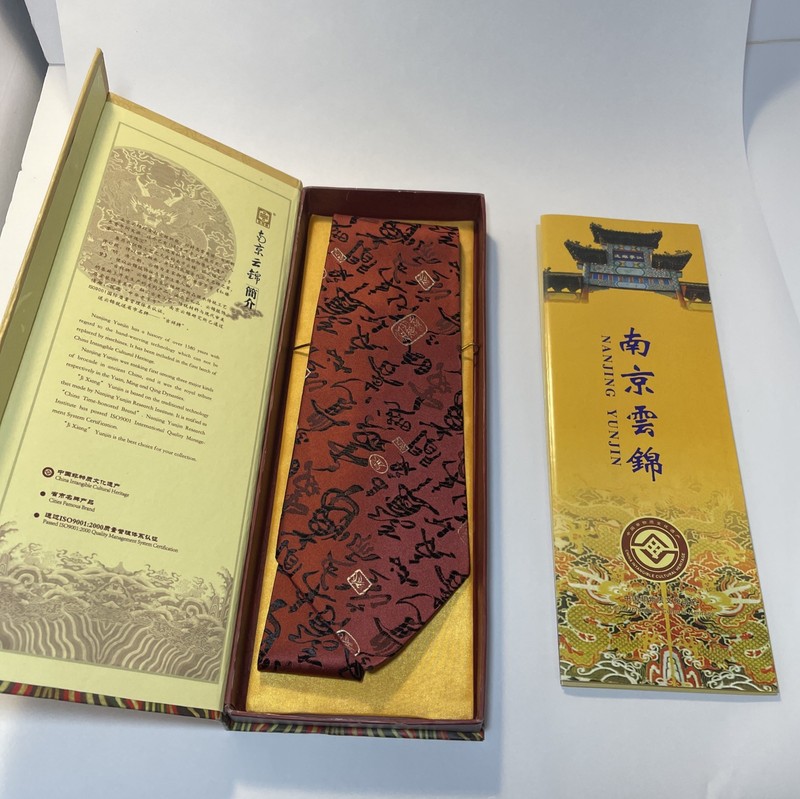  Brocade burgundy necktie featuring oriental calligraphy and silver lamp motifs