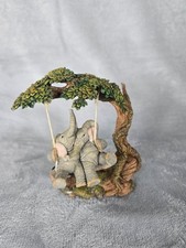 Tuskers 'Two n' Fro' Figurine. 91288. 6" Tall. 6" Wide. Good Condition.