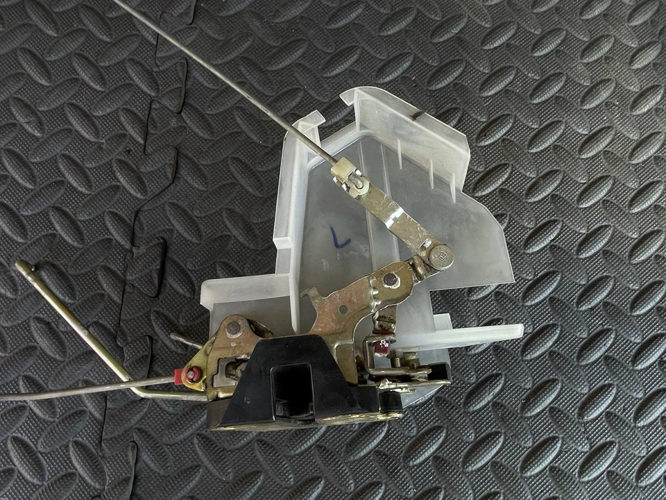 Actuador de pestillo de cerradura de puerta Toyota T100 93-98 lado izquierdo manual OEM Foto 4 de 4