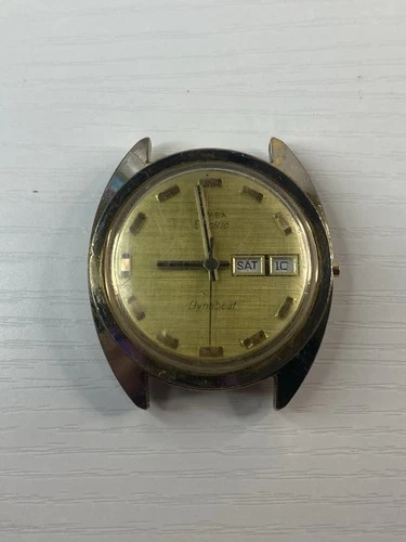 Vintage Timex Dynabeat Electric Watch Day & Date Gold Tone For Parts or Repair.