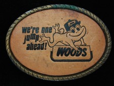 QF01112 VINTAGE 1970s  WOODS WE'RE ONE JUMP AHEAD  HEAVY MACHINERY BUCKLE