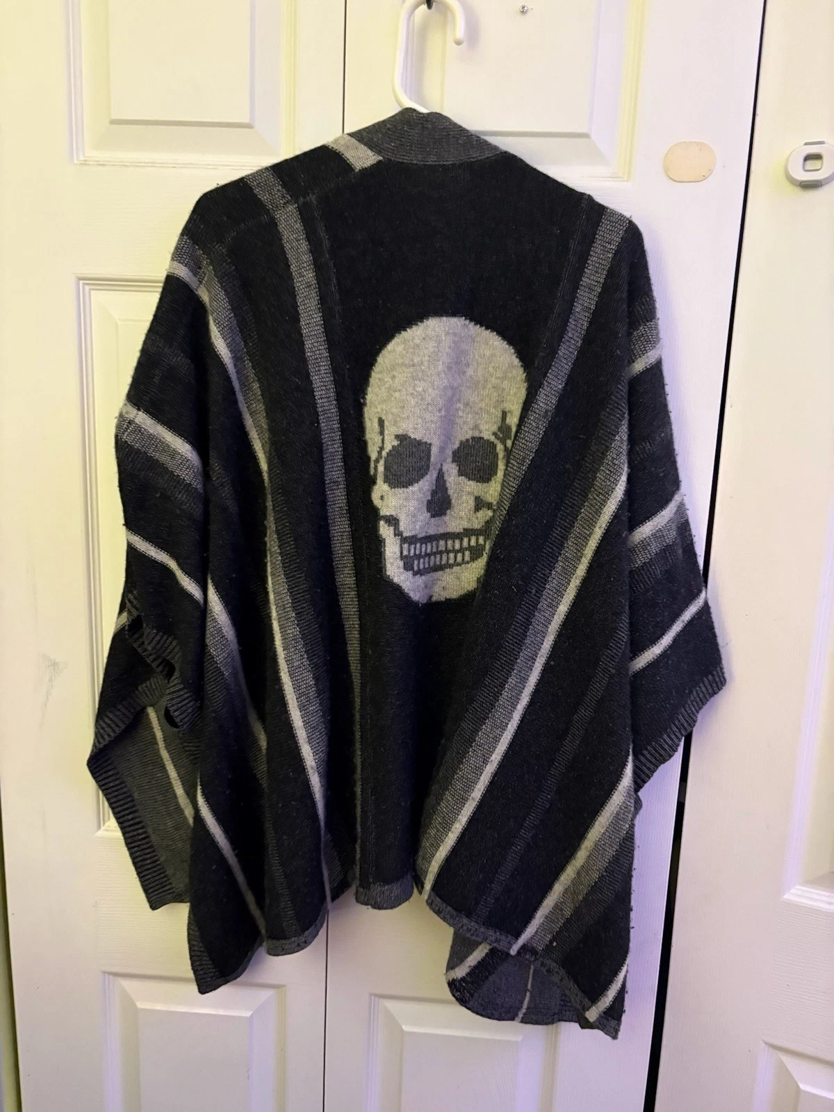 Skull Cashmere striped gray and black poncho shawl
Opens in a new window or tab