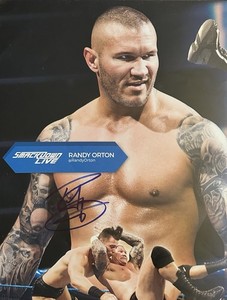 RANDY ORTON HAND SIGNED WWE SMACKDOWN PROGRAM PAGE! FUTURE HOF, MULTI TIME CHAMP