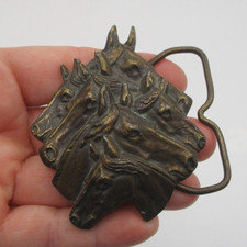 1976 BERGAMOT BRASS WORKS 6 HORSE HEAD BELT BUCKLE