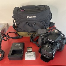 Canon PowerShot SX60 HS 16.1MP Digital Camera, case battery, charger 8GB card