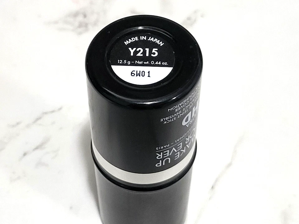 Base en barra Make Up For Ever Ultra HD Y215 amarillo alabastro, dañada Foto 2 de 2