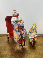 Enesco Clown On Pedicab And The boy on the tricycle