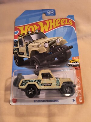 HOT WHEELS '67 JEEPSTER  COMMANDO HW HOT TRUCKS, BEIGE, MINT ON CARD