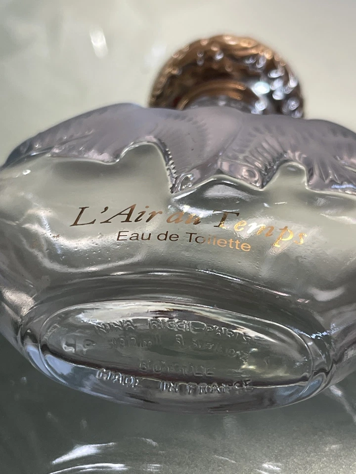 4 Flacons Eau de Toilette Nina Ricci L’Air du Temps, 200 ml et 100 ml (vide)  - Photo 2/4
