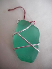 Silver Wire wrapped Green Sea Glass pendant