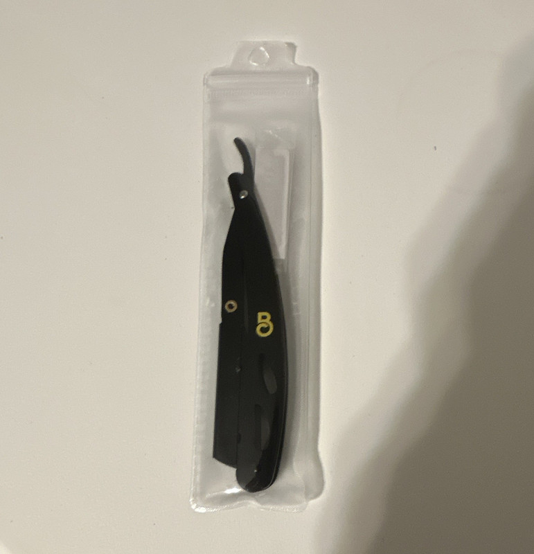 Black Folding Straight Razor with Plastic Sleeve Cover and Replacement Blades