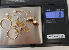 11.8 Grams of 14 Kt. Gold some small Diamonds, Garnets, Pearls 8 Pieces 2108.71 per troy oz