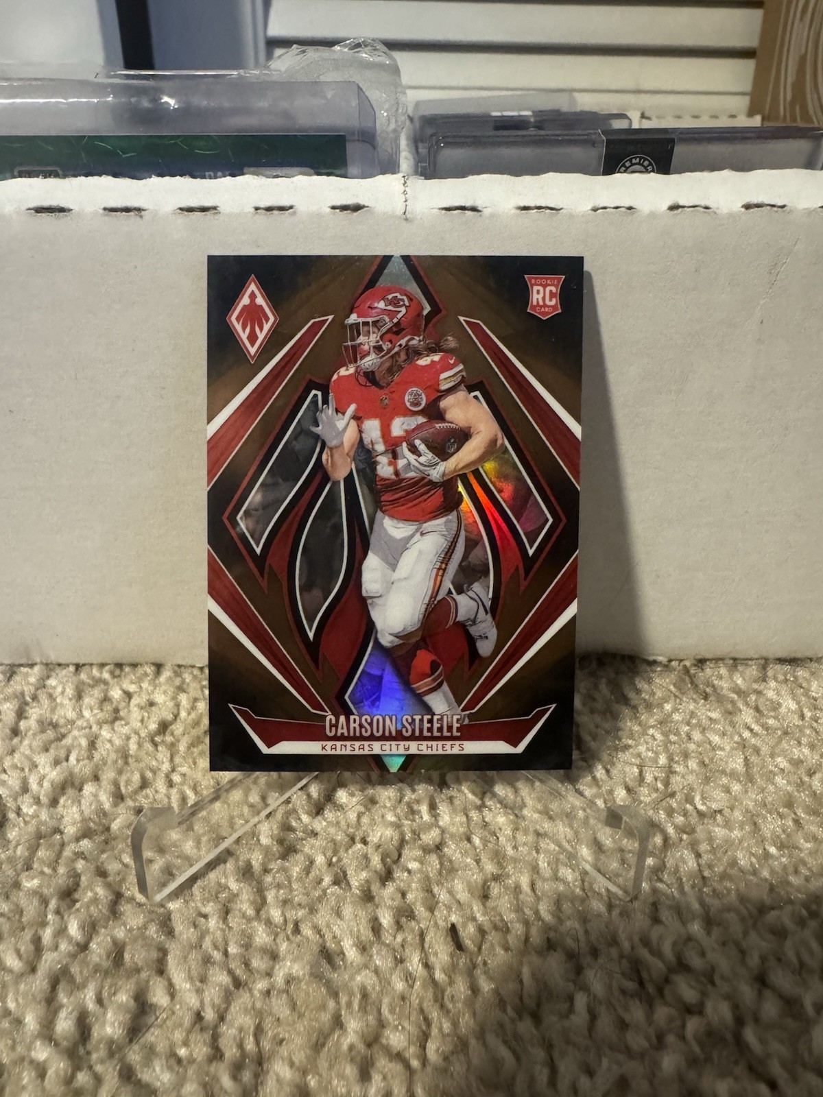 Carson Steele 2024 Panini Phoenix - Rookies #230 Gold Fade #/125 (RC) Chiefs