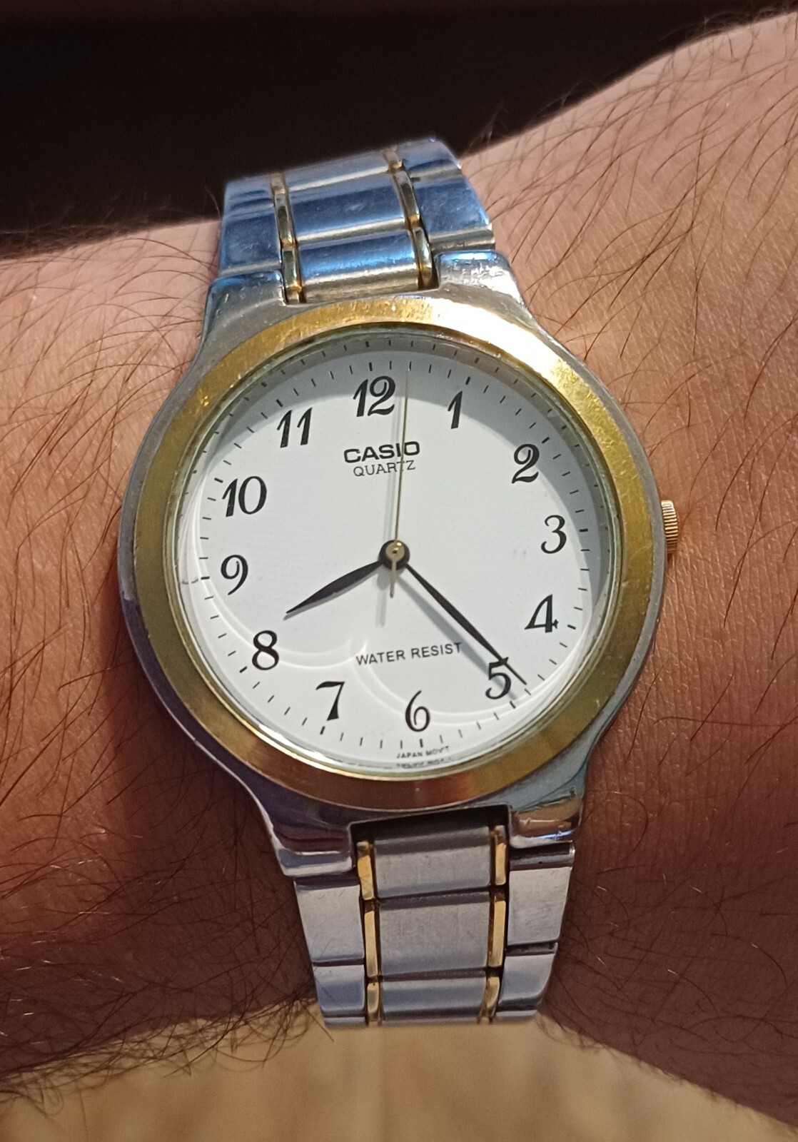 Casio Men's Silver and Golden Steel Band Wristwatch for Stylish Durability